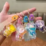Cute Spaceman Liquid Quicksand Keychain - Galaxy Bottle Bag Charm
