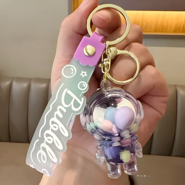 Cute Spaceman Liquid Quicksand Keychain - Galaxy Bottle Bag Charm